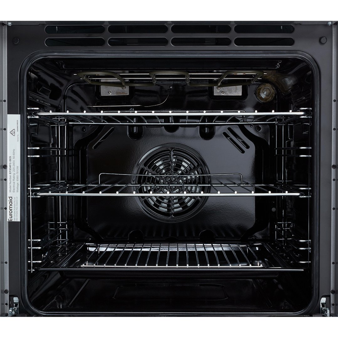 Interior view of a black oven with three racks and a fan
