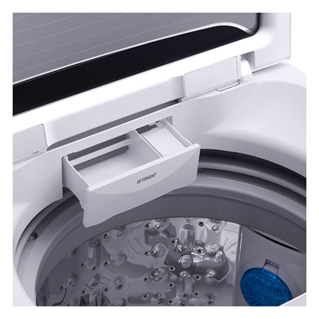 Close up of a top load washing machine with the detergent dispenser open
