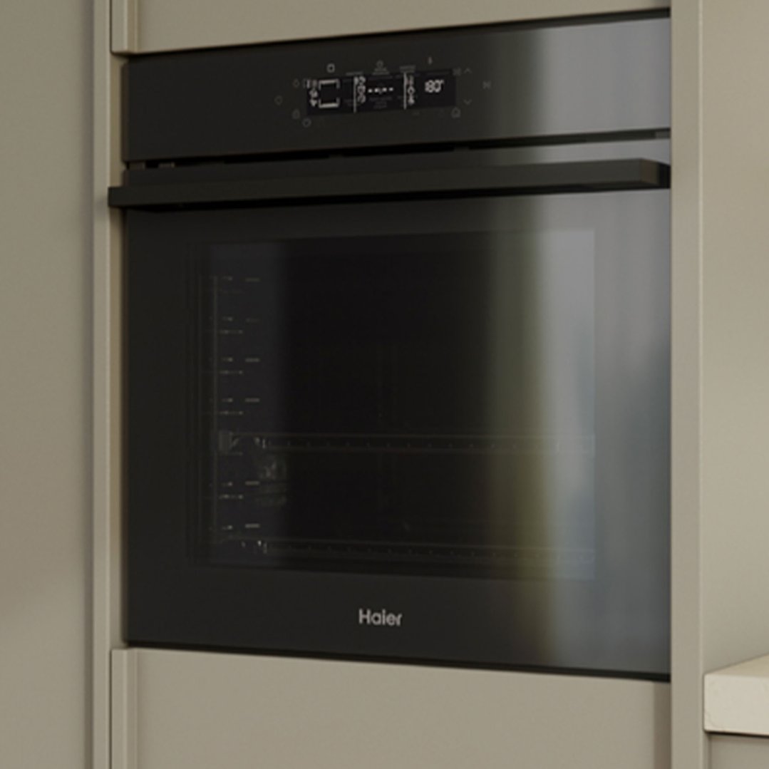 Built-in oven with a dark glass door and digital display in a kitchen setting