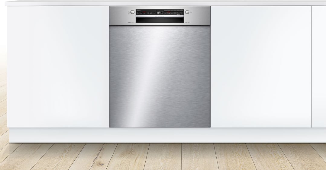 Built-under Bosch Serie 4 dishwasher in a white kitchen setting