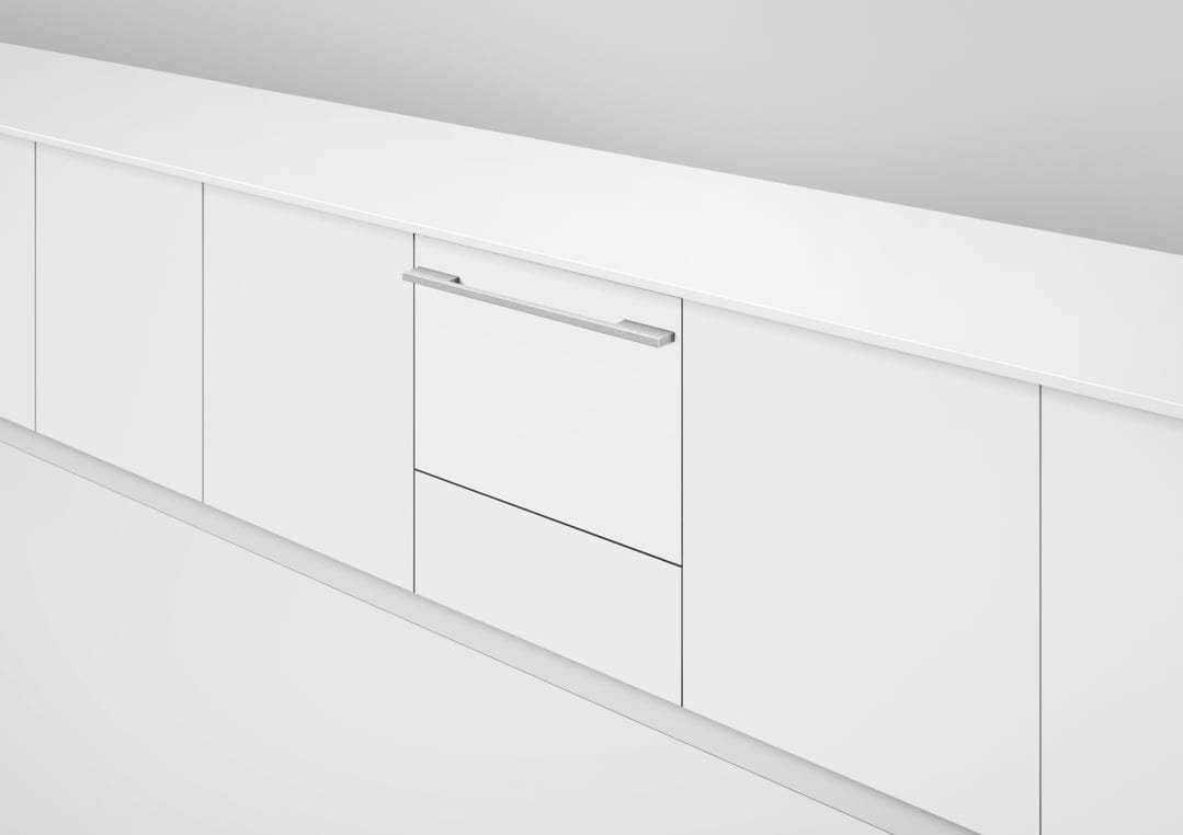 Integrated Tall Single DishDrawer Dishwasher with a silver handle in a white kitchen