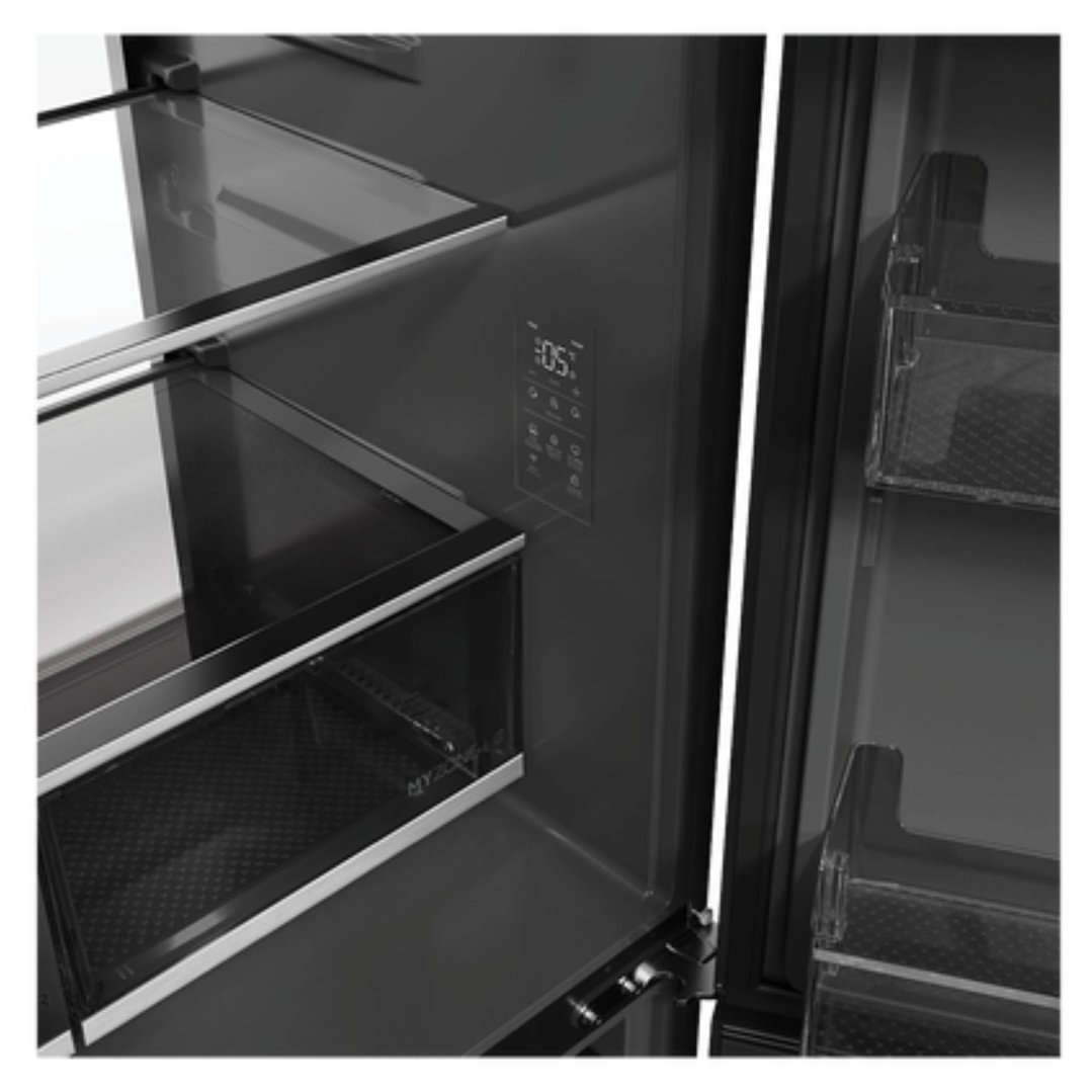 Interior view of a black quad door refrigerator freezer with shelves and drawers