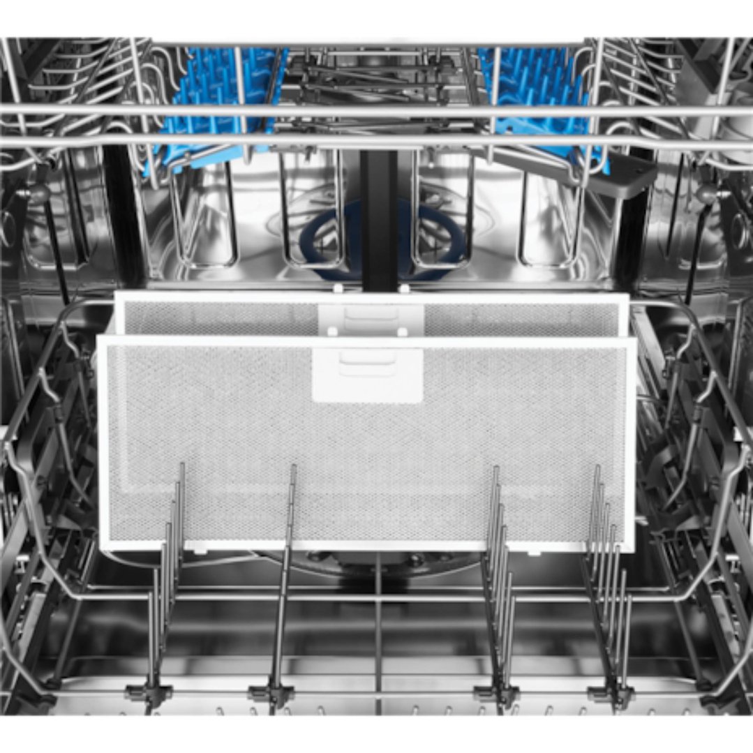 Inside view of an integrated rangehood with metal mesh filters and racks