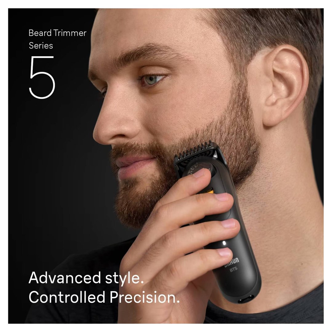 Man trimming his beard with a BRAUN Series 5 Beard Trimmer
