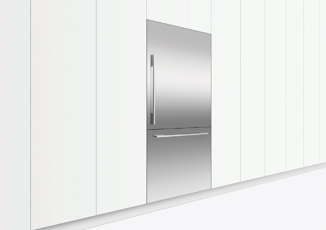 Integrated refrigerator freezer in a white kitchen setting