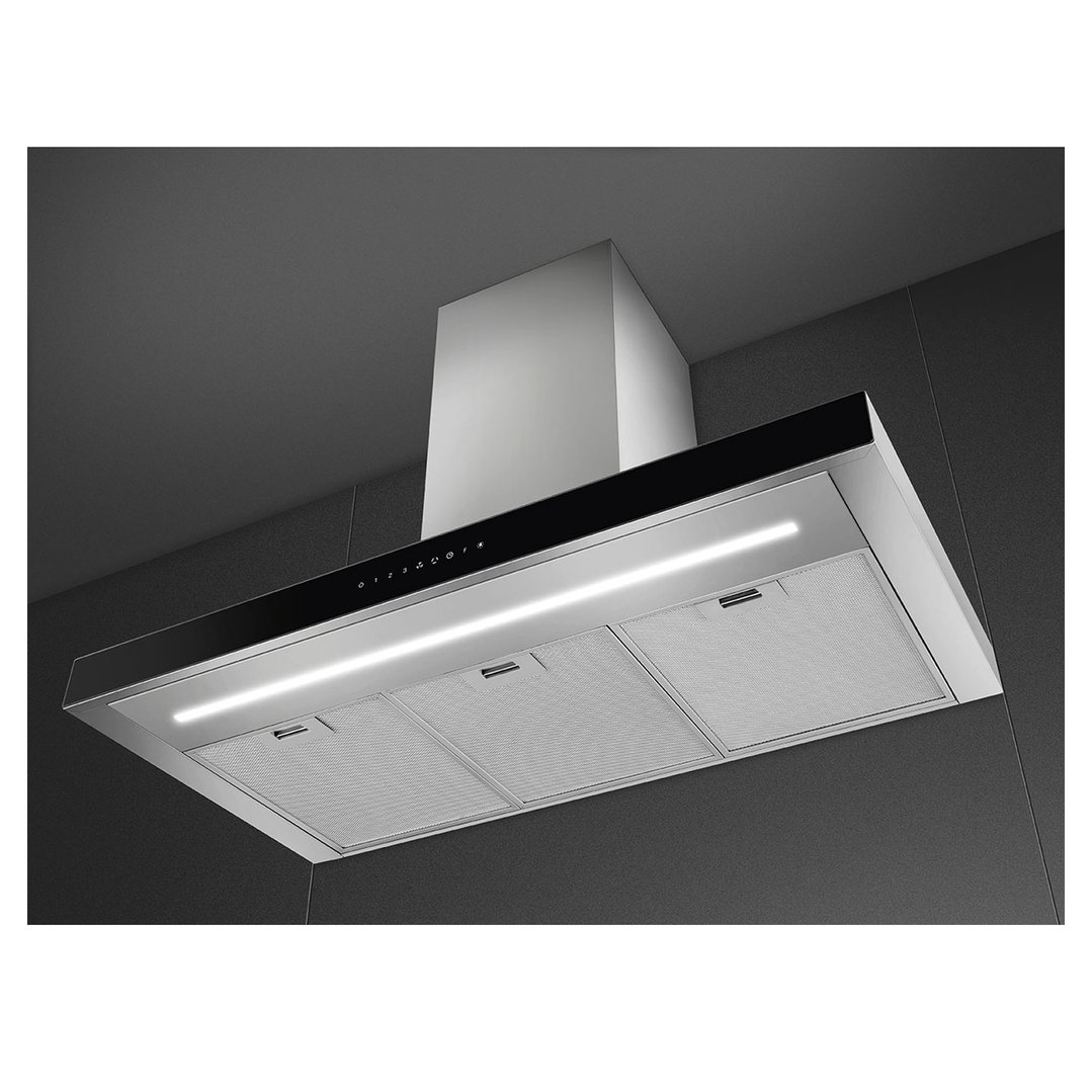 A stainless steel SMEG rangehood with a black control panel mounted on a dark wall