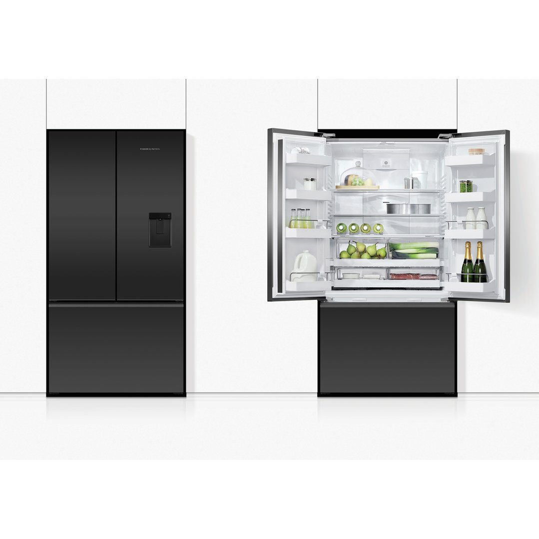 Black French door refrigerator freezer, one closed and one open showing interior