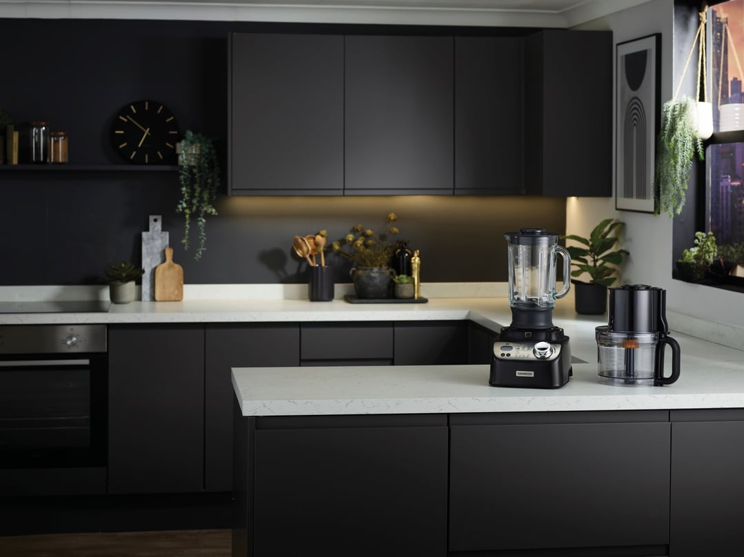 KENWOOD MultiPro XL Weigh+ Food Processor on a kitchen counter in a dark kitchen