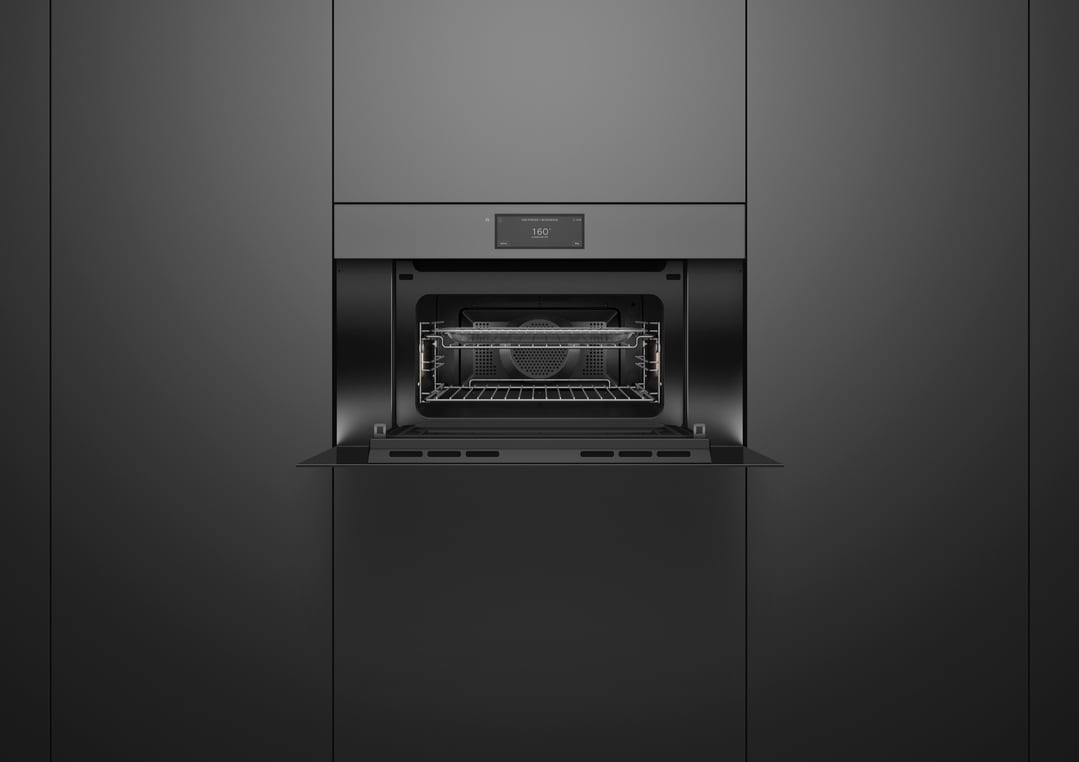 Built-in combi-microwave oven with door open, displaying interior and controls