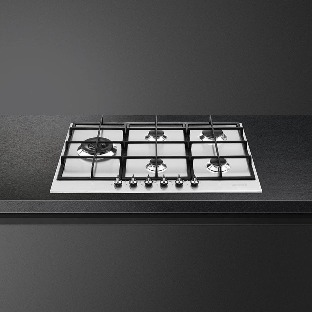 SMEG 72cm Classic Gas Cooktop built into a dark kitchen countertop