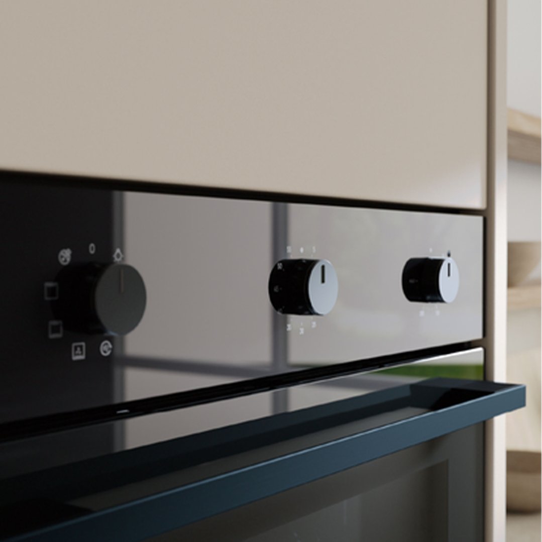 Close up of a built-in oven with control knobs in a kitchen setting