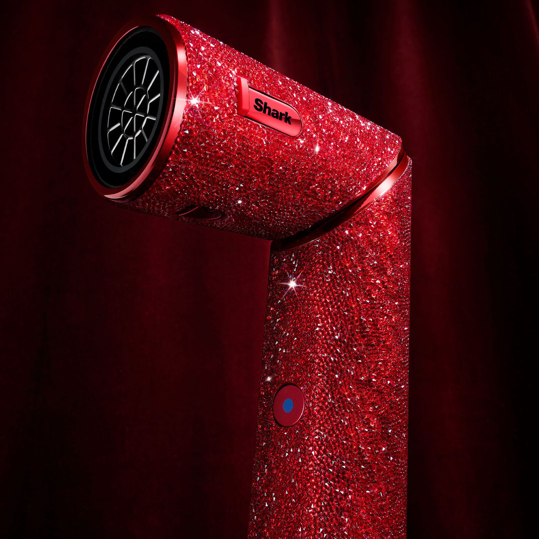 Red ruby diamond limited edition hair styler on a dark red background