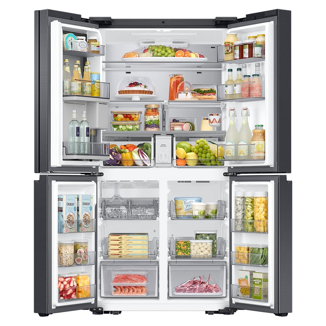 A SAMSUNG French Door Refrigerator with all doors open, revealing food items