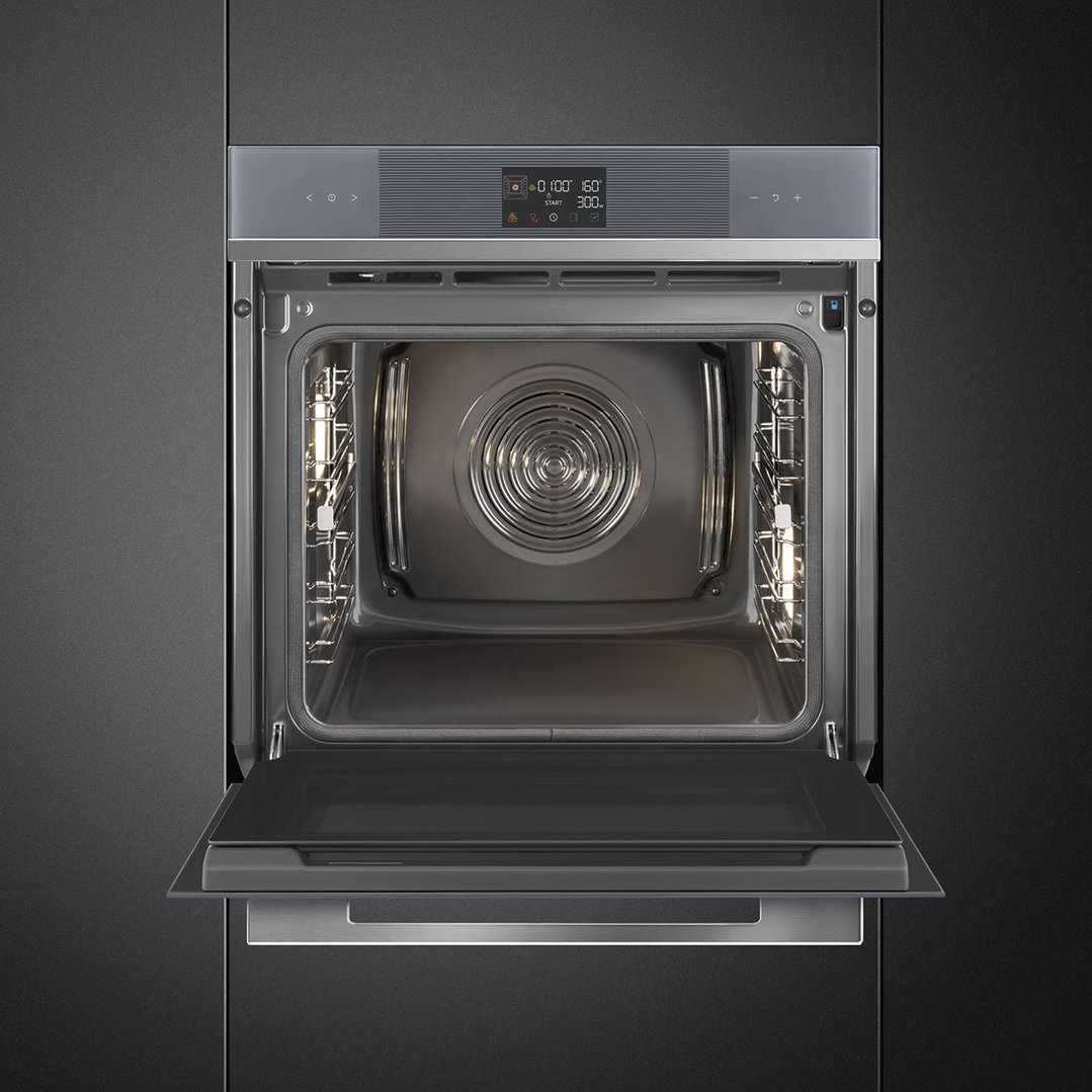 Built-in oven with its door open, showing the interior and control panel