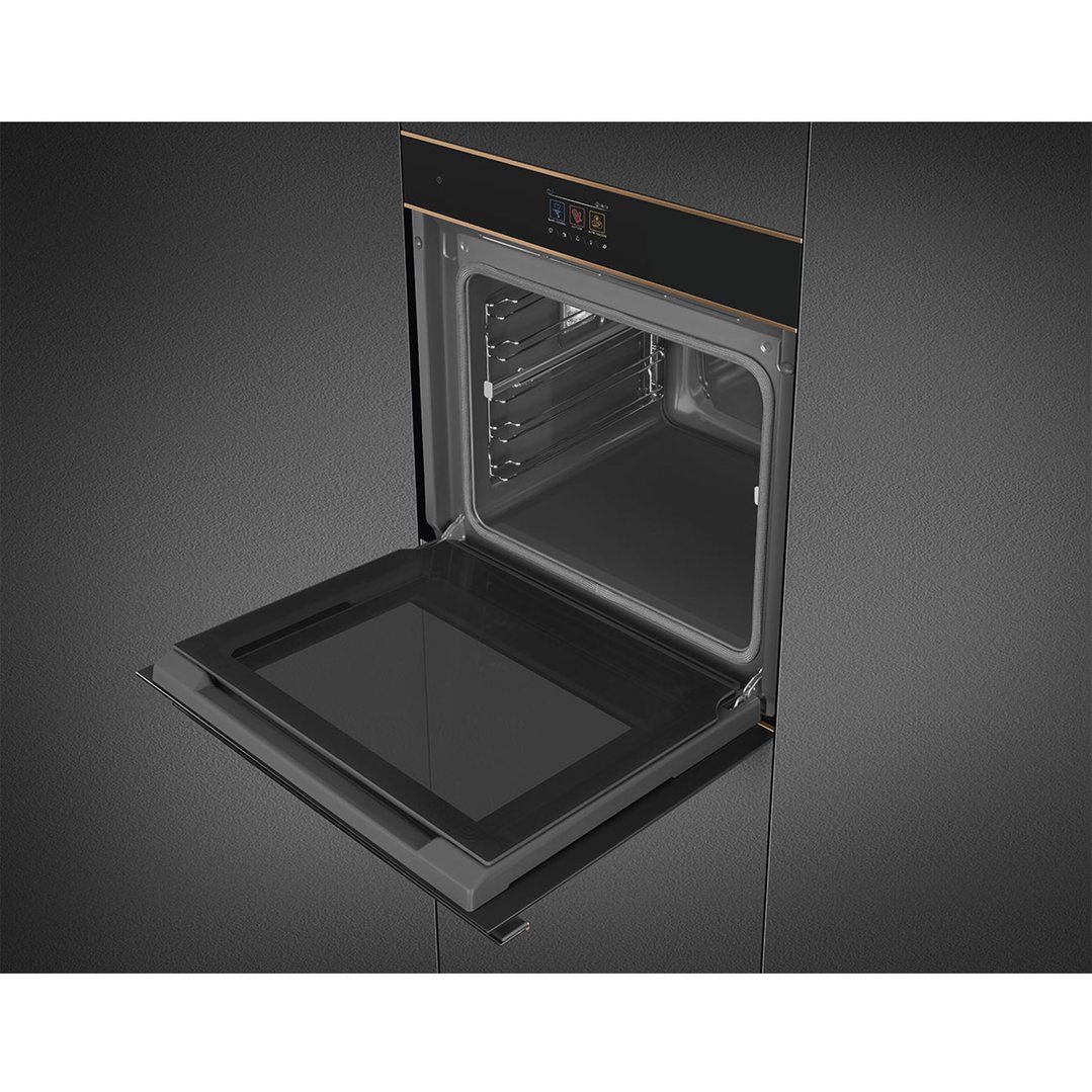 Built-in oven with door open, showing interior racks and controls