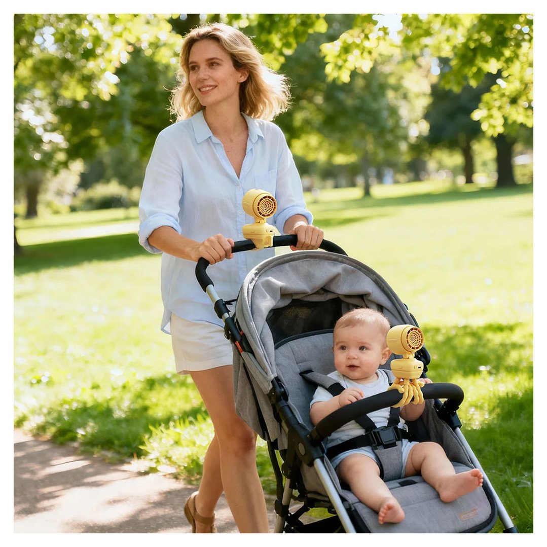 Woman pushing a baby in a stroller with two CLIP STROLLER Fans attached