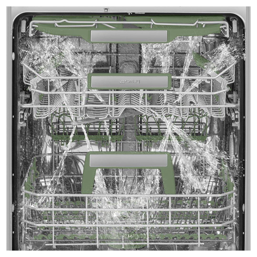 Dishwasher interior with water spraying during a wash cycle