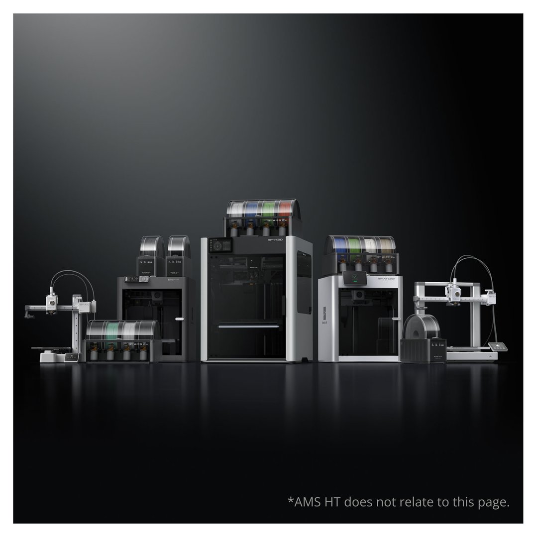 Multiple 3D printers and material systems displayed on a dark surface
