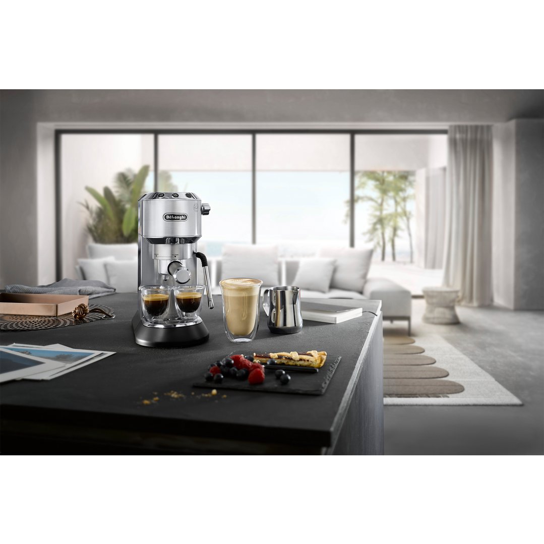 Dedica Arte Manual Coffee Machine on a counter with coffee and pastries