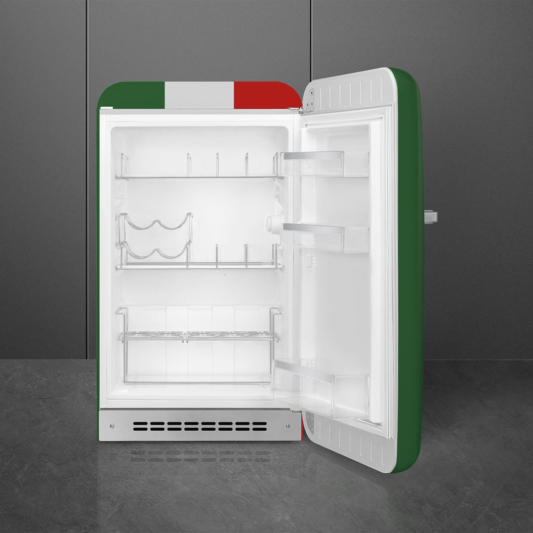 Open retro refrigerator with Italian flag design in a modern kitchen setting