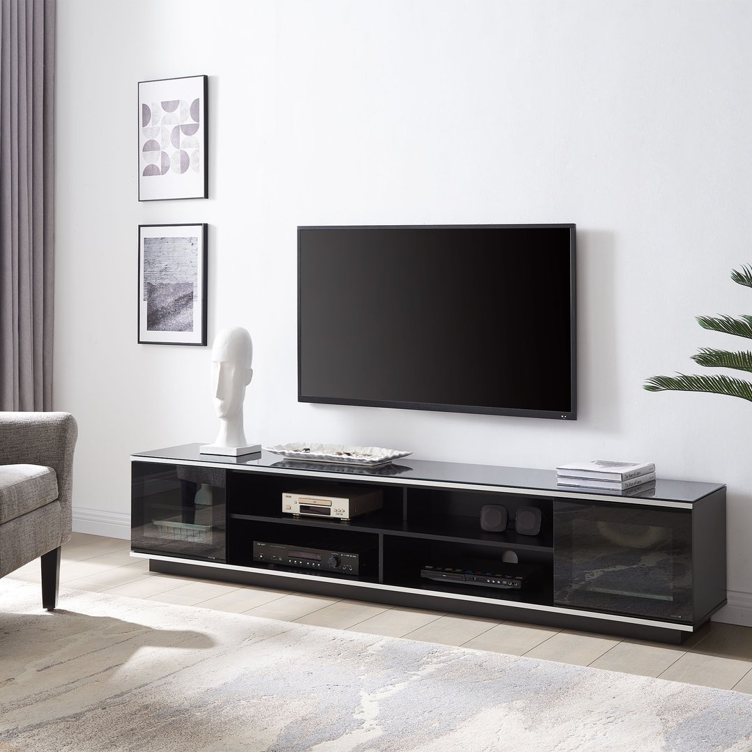 Black tvCabinet with a TV and decor in a modern living room