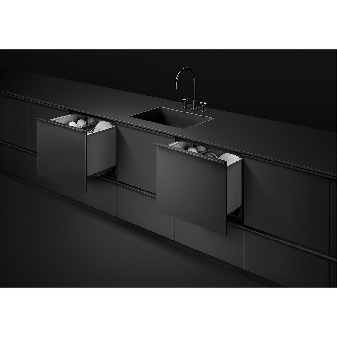 Two integrated DishDrawer dishwashers open in a modern black kitchen