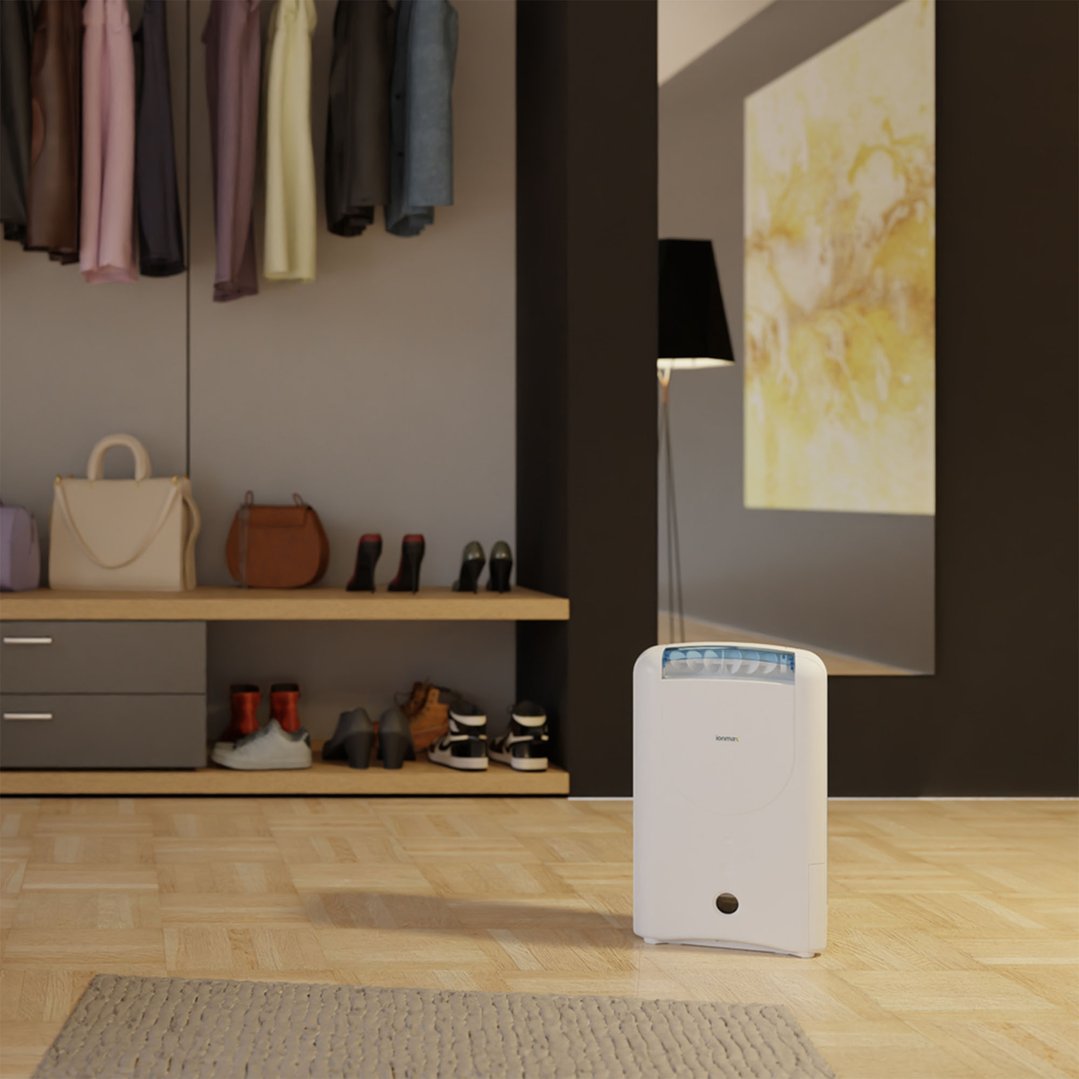 IONMAX 7L Zeolite Desiccant Dehumidifier on a wooden floor in a room