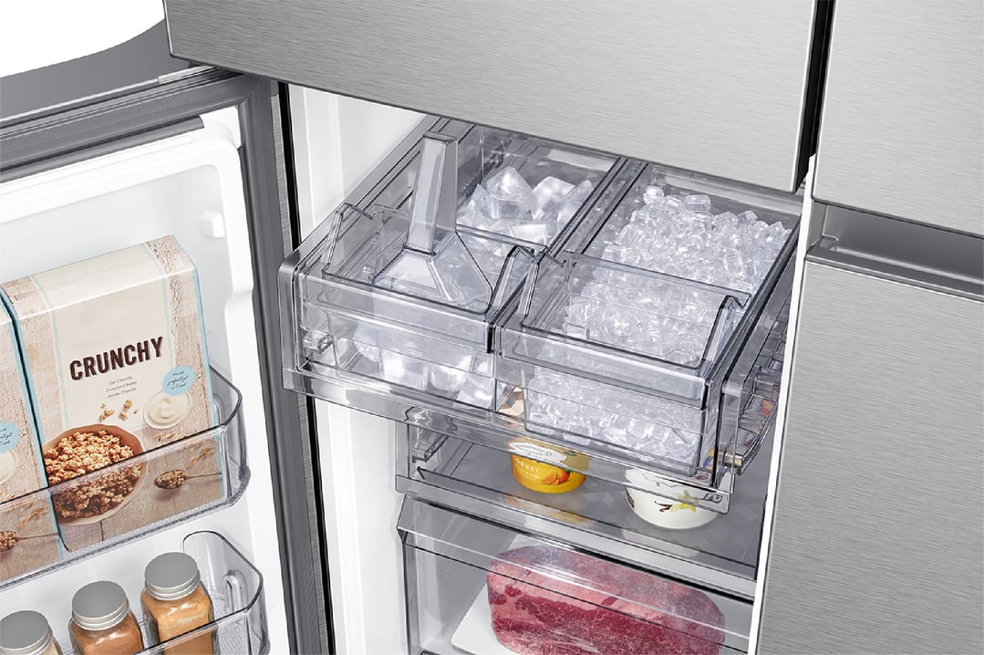 Open French Door Fridge showing ice maker, cereal boxes, and spices