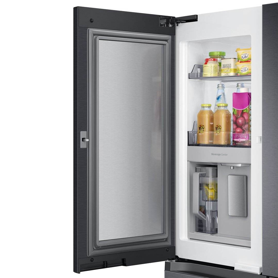 Open French door fridge showing the beverage center and items on shelves