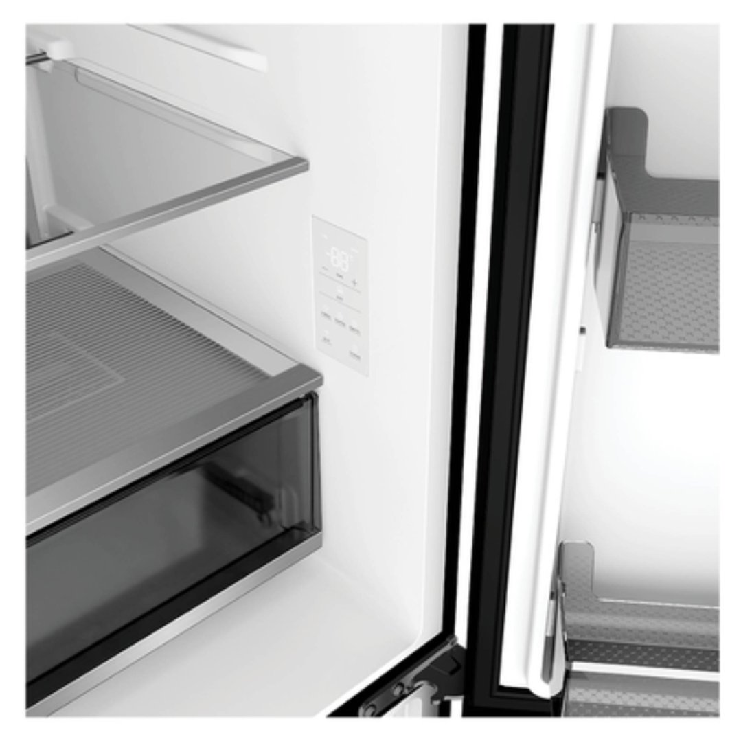 Interior view of a refrigerator freezer with shelves and a control panel