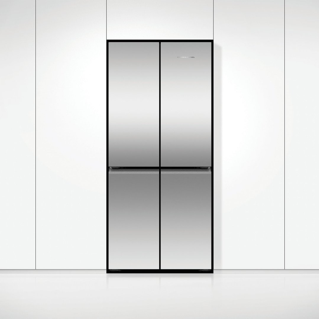 A Fisher & Paykel quad door refrigerator freezer integrated into white kitchen cabinetry