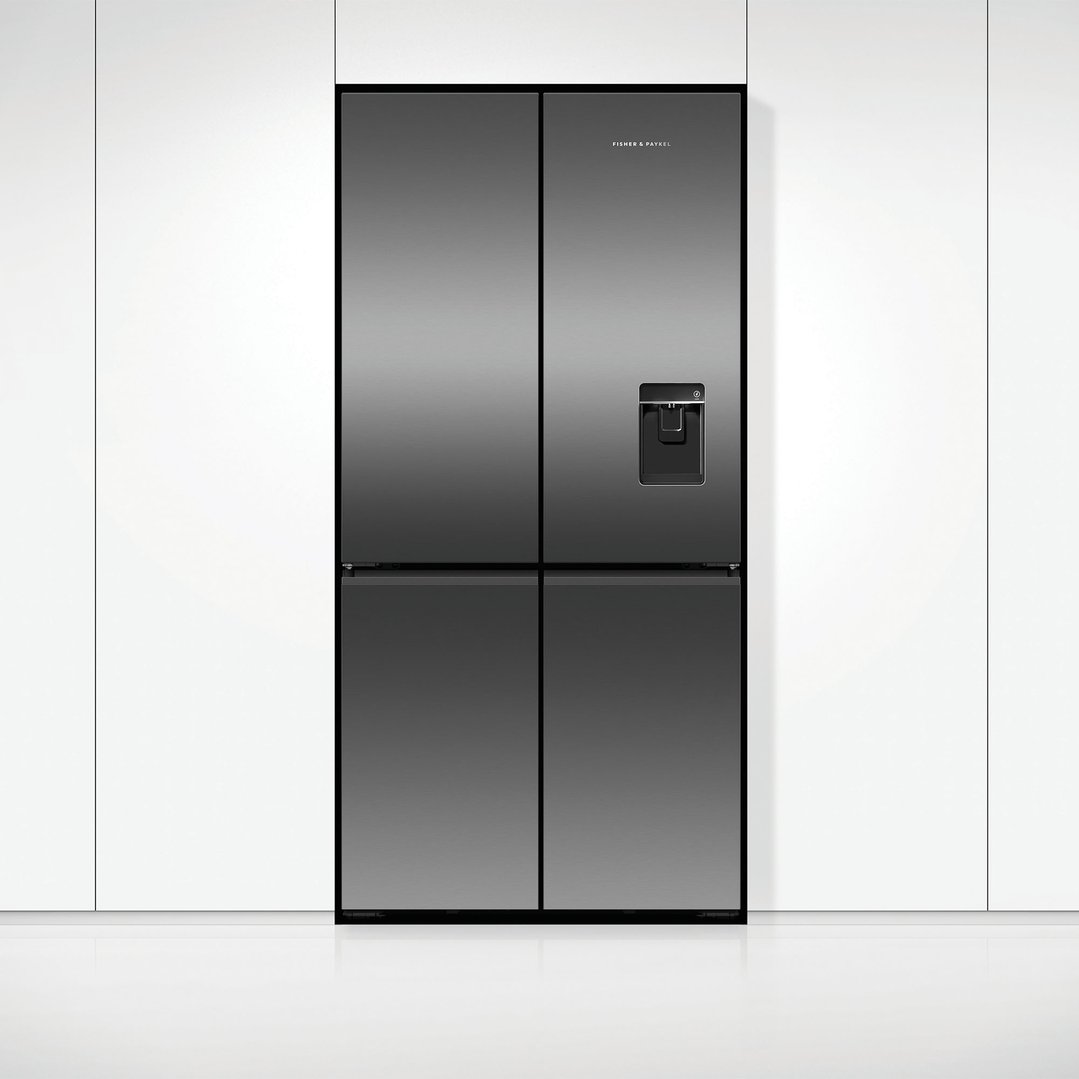 A black Fisher & Paykel quad door refrigerator freezer built into white cabinetry