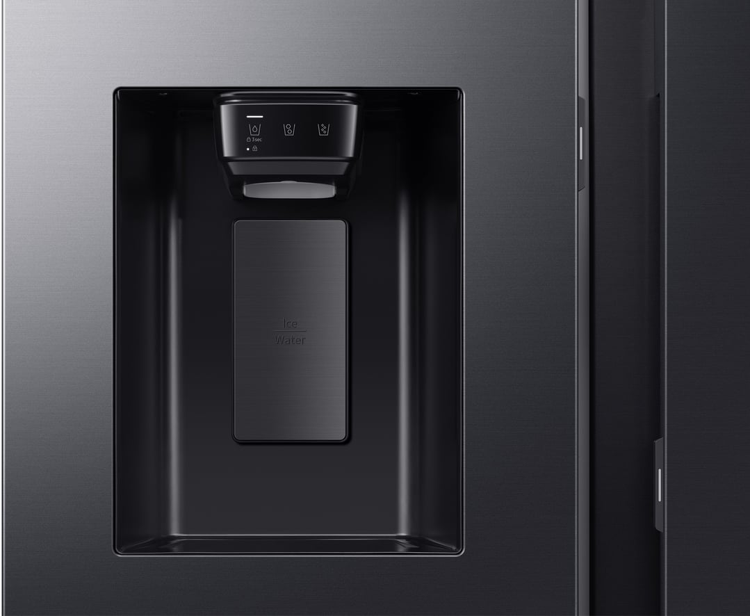 Close up of the black refrigerator's ice and water dispenser