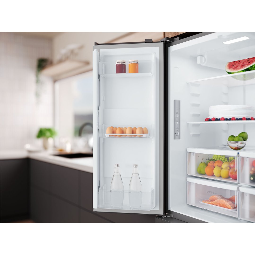 Open matte charcoal black quad door fridge in a modern kitchen