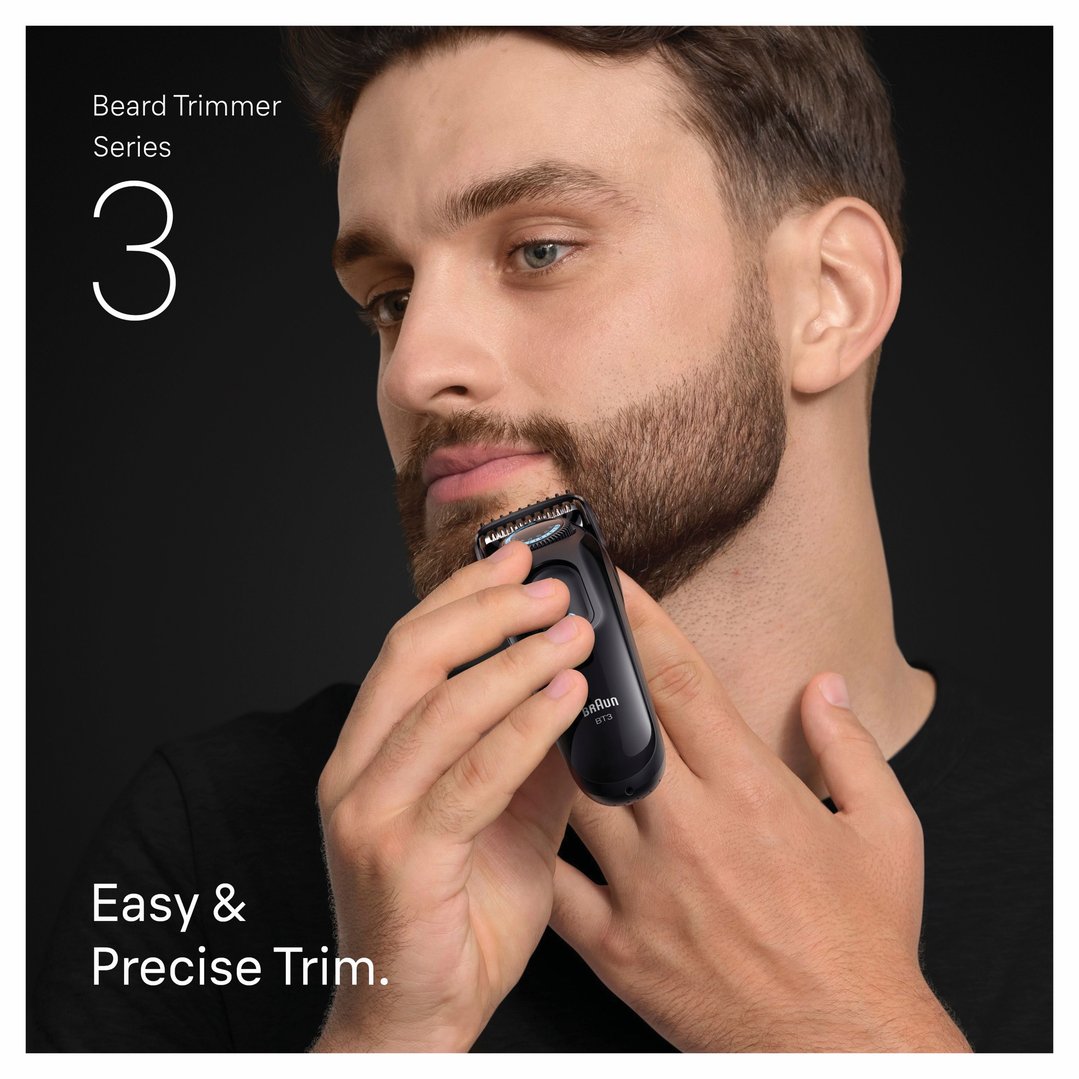 Man trimming his beard with a Braun Beard Trimmer Series 3