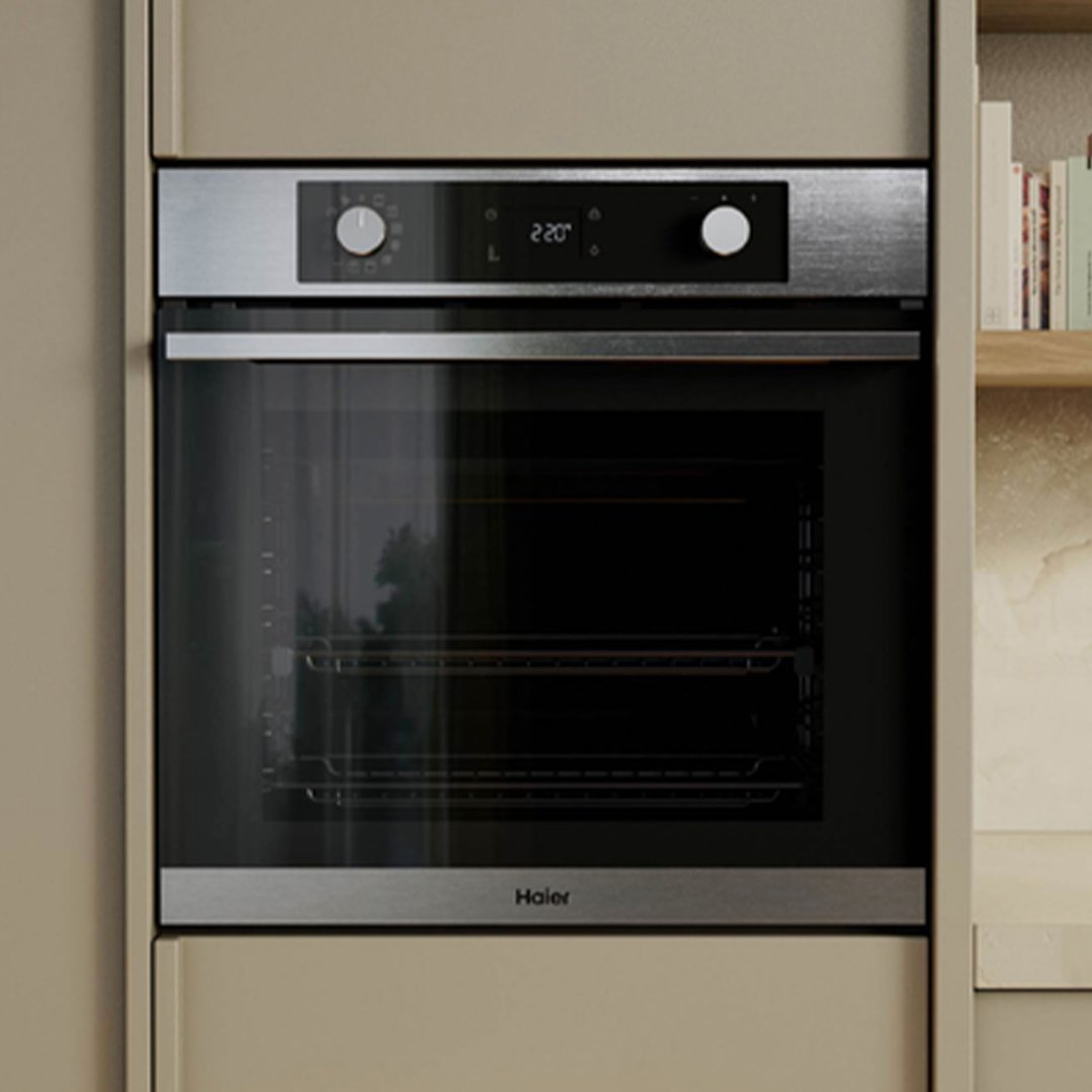 Built-in Haier oven with a stainless steel finish in a modern kitchen setting