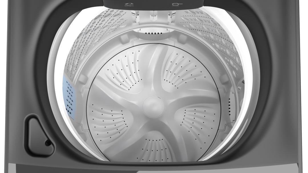 Close-up view inside the drum of a top load washing machine