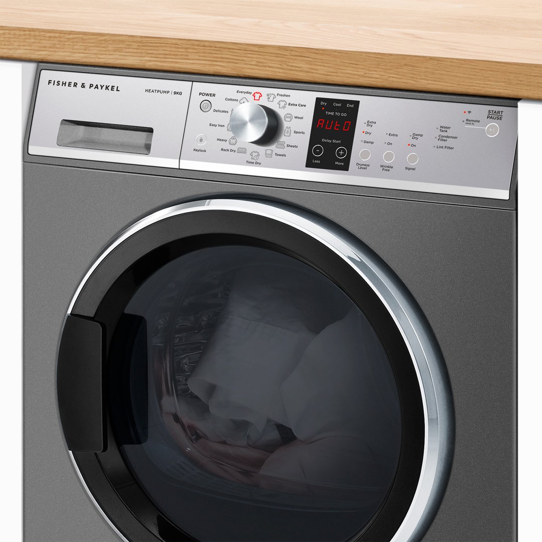 Fisher & Paykel 9kg Series 7 Heat Pump Dryer under a wooden countertop