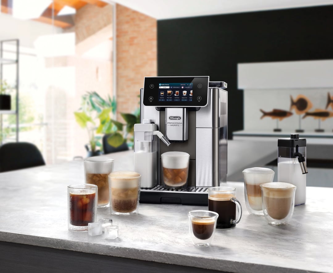 Fully automatic coffee machine on a counter with various coffee drinks