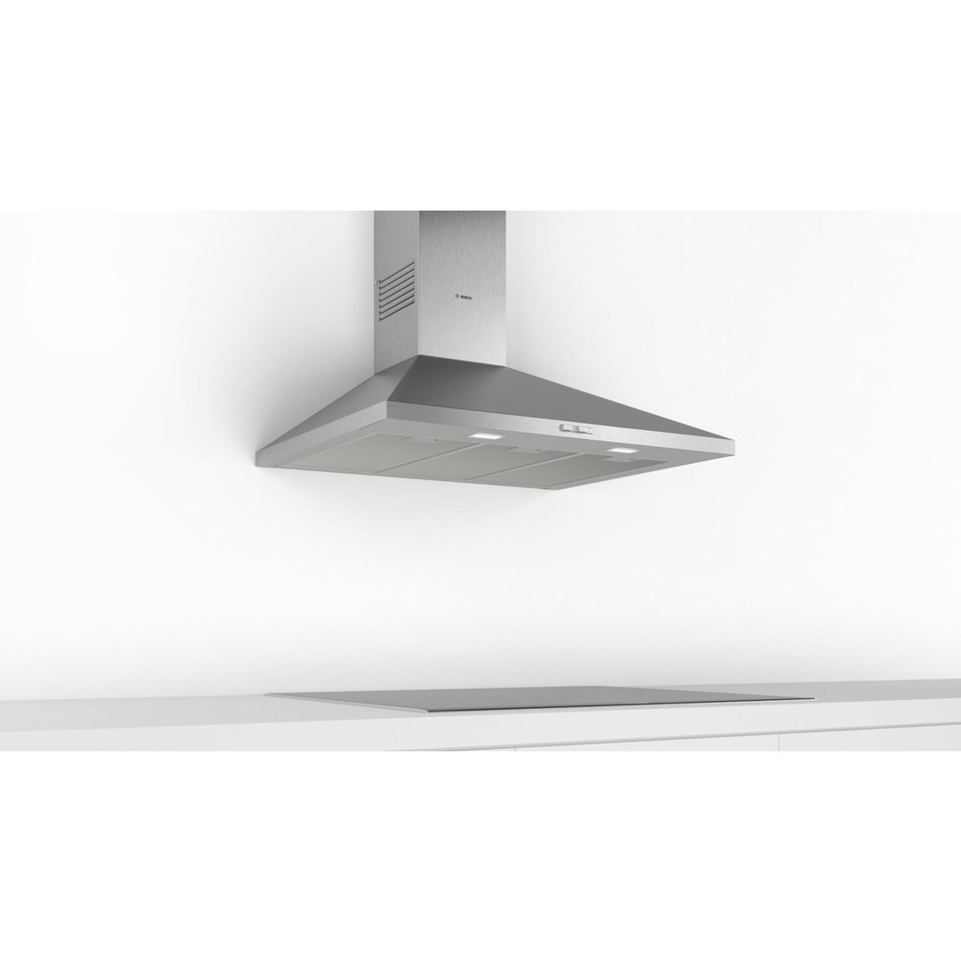 A stainless steel Bosch rangehood mounted above a cooktop in a modern kitchen