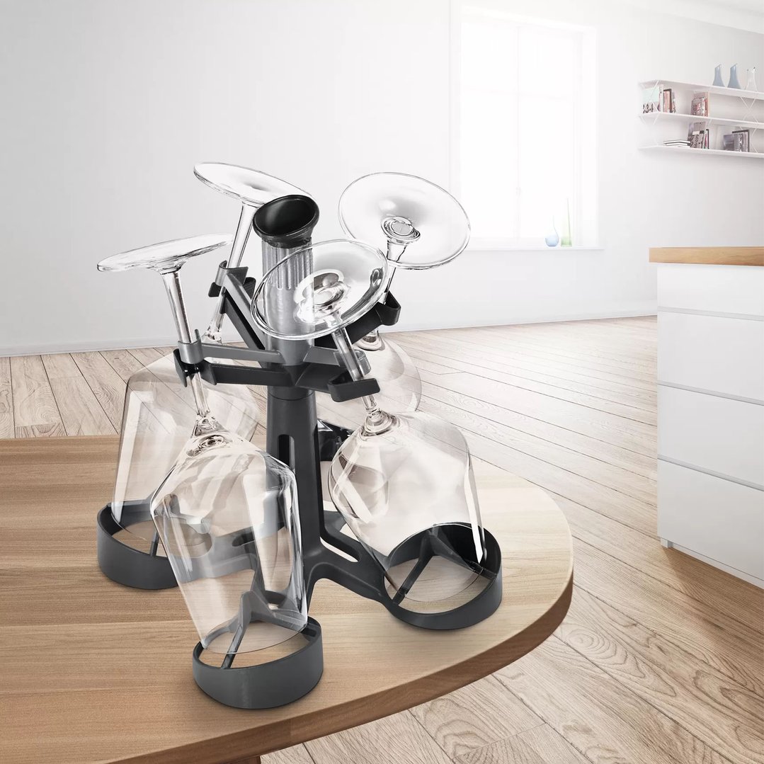 GlassSecure holder with wine glasses on a wooden table in a modern kitchen