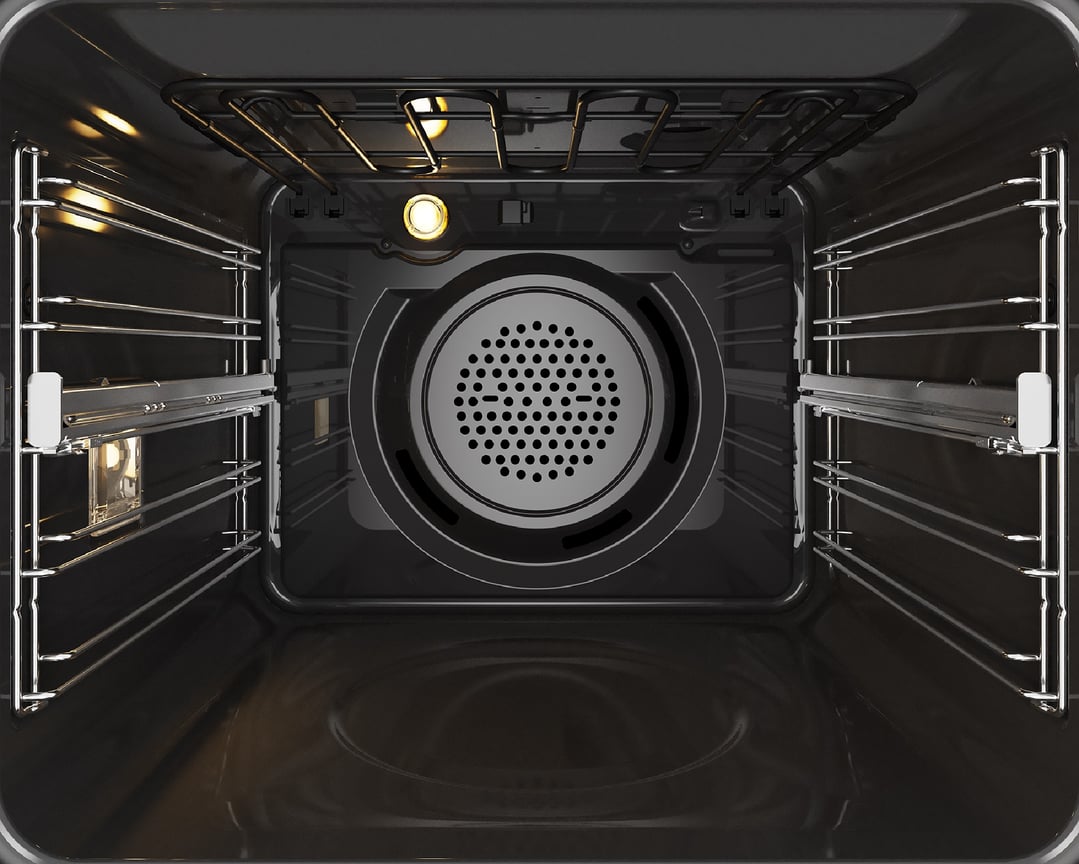 Interior view of a dark oven with racks and a fan