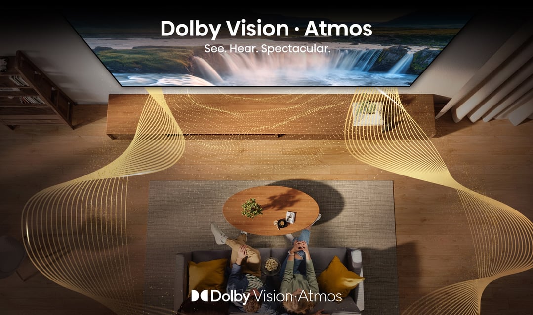 Overhead view of two people watching a TV in a living room