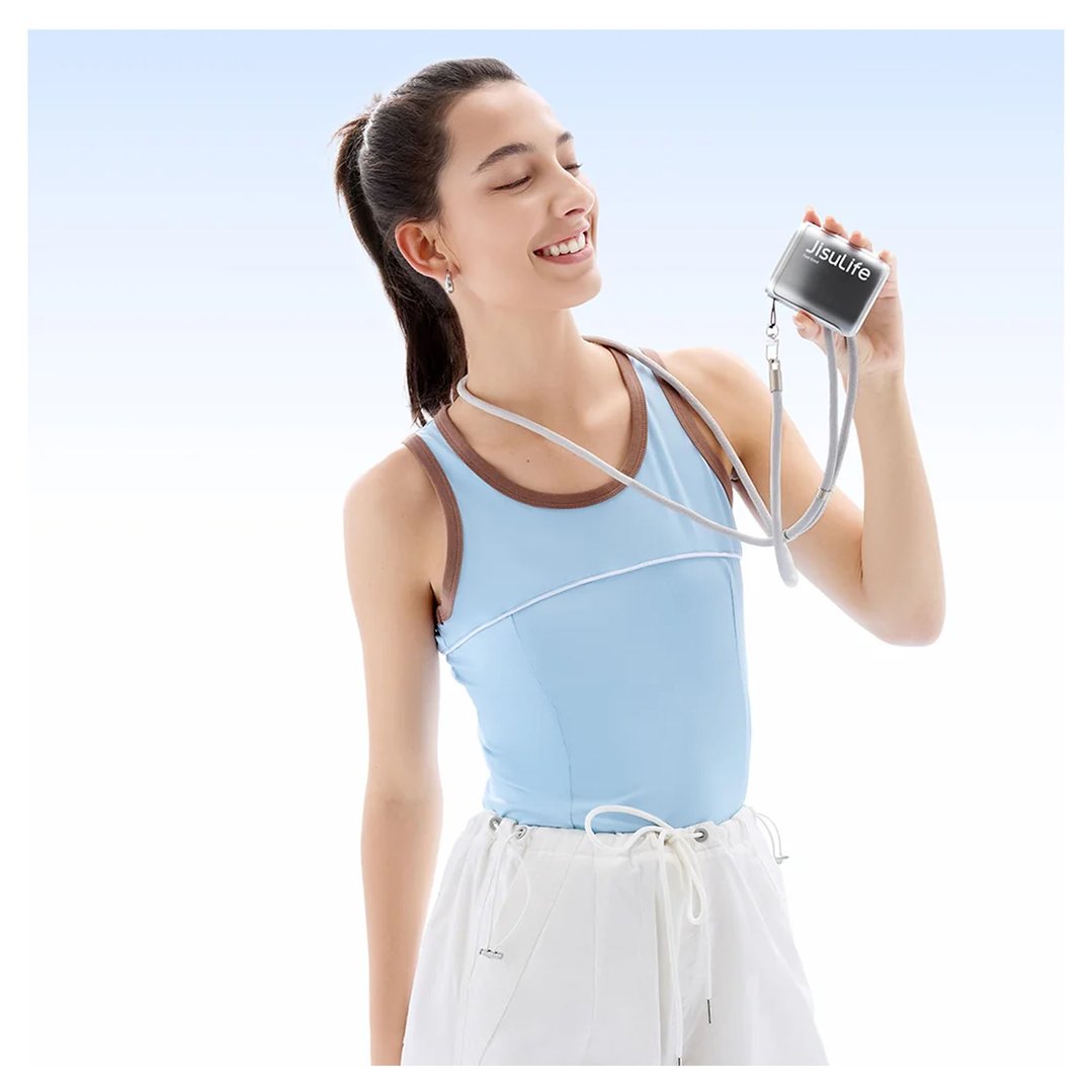 Woman smiling and holding a JISULIFE neck fan with a lanyard