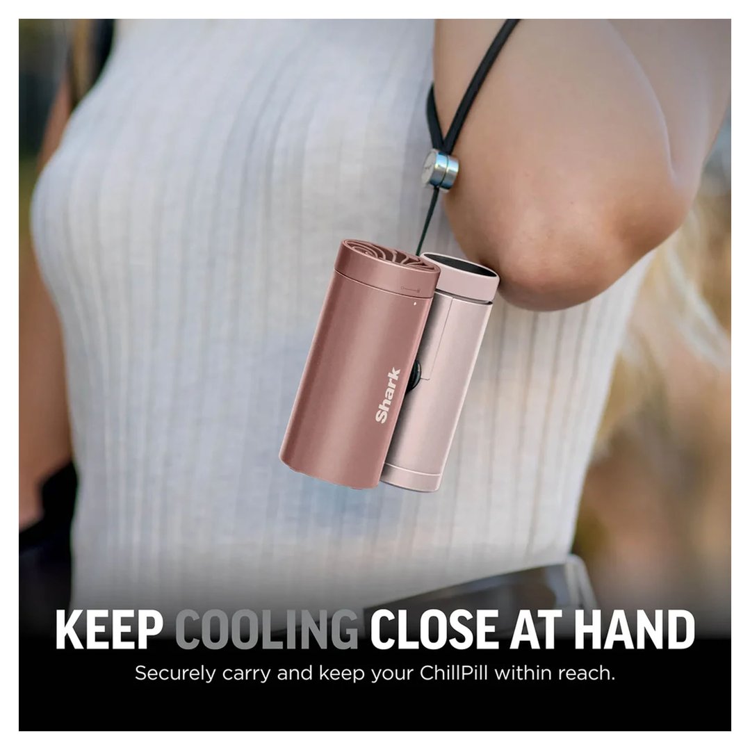 Two Shark ChillPill personal cooling devices hanging from a person's arm
