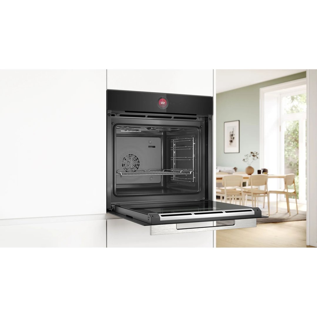 BOSCH Series 8 multifunction oven with door open in a modern kitchen setting