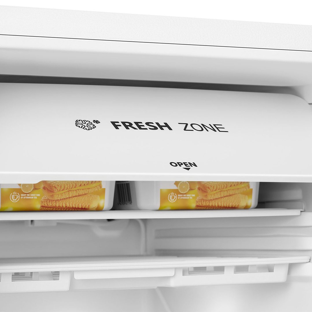 Close up of the fresh zone compartment inside a white bar fridge