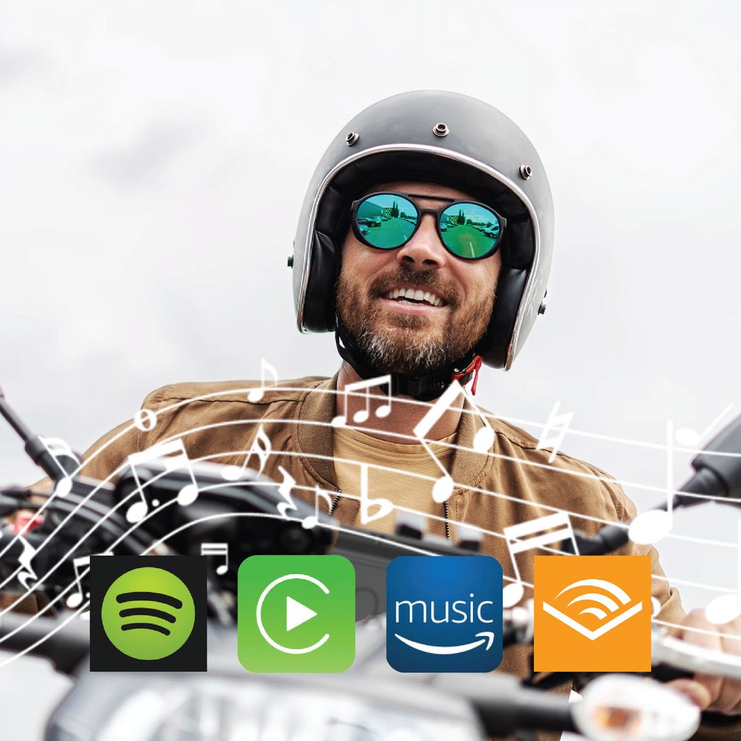 Man on a motorbike wearing a helmet and sunglasses with music apps