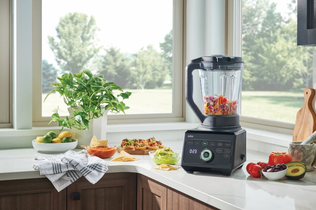 Braun PowerBlend 9 Jug Blender on a kitchen counter with food and drinks