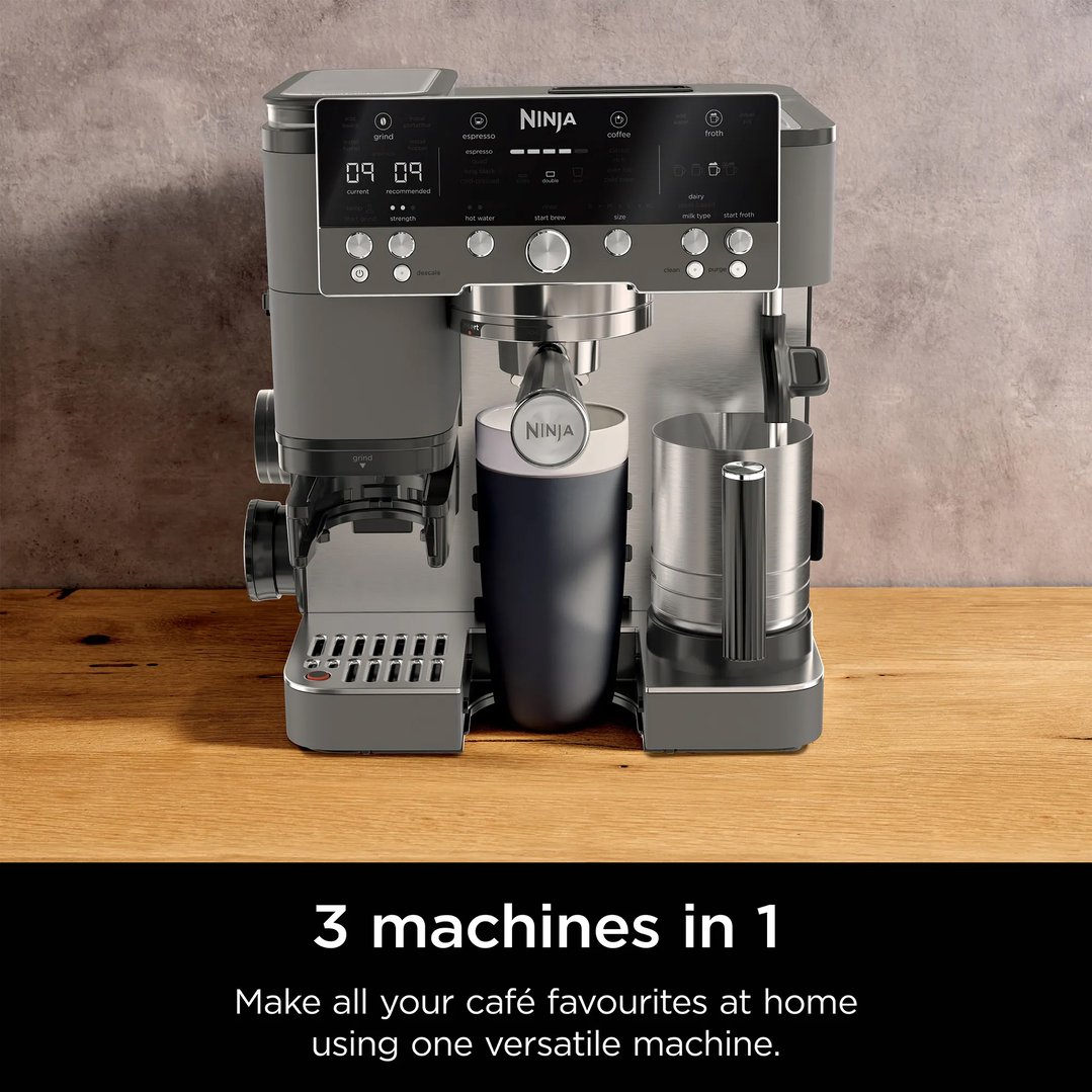Ninja coffee machine on a wooden countertop with a concrete wall background